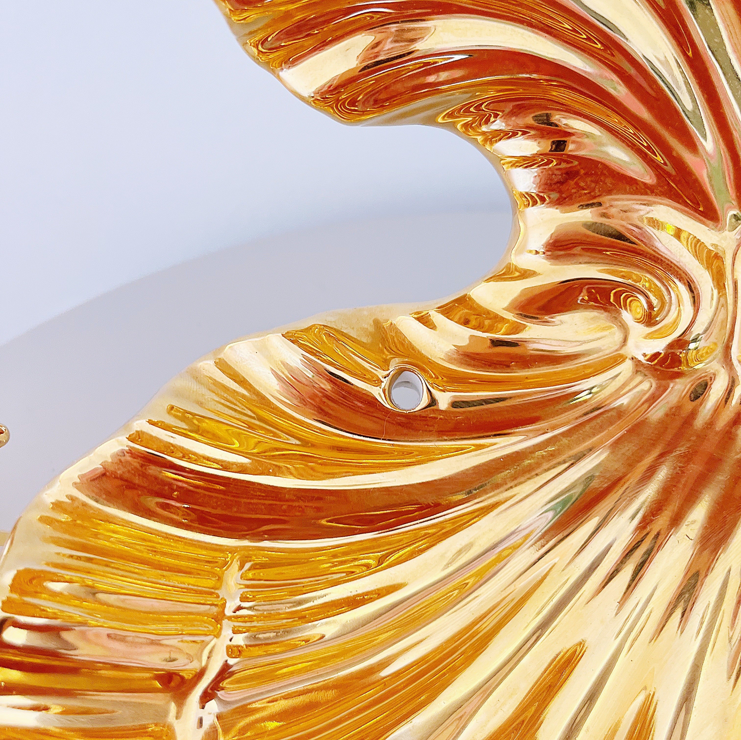 Grand coquillage doré