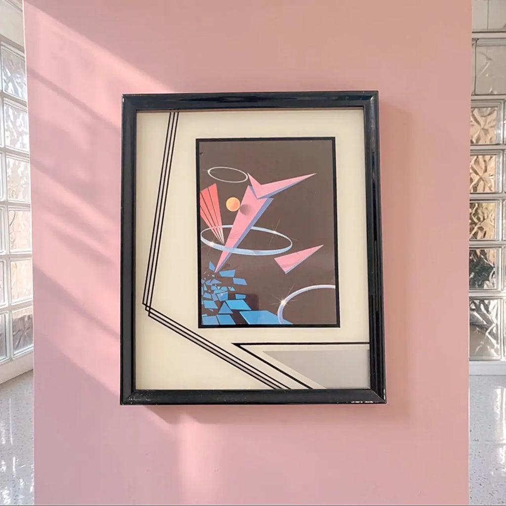 Tableau vintage années 80, composition géométrique rose et bleue, cadre laqué noir