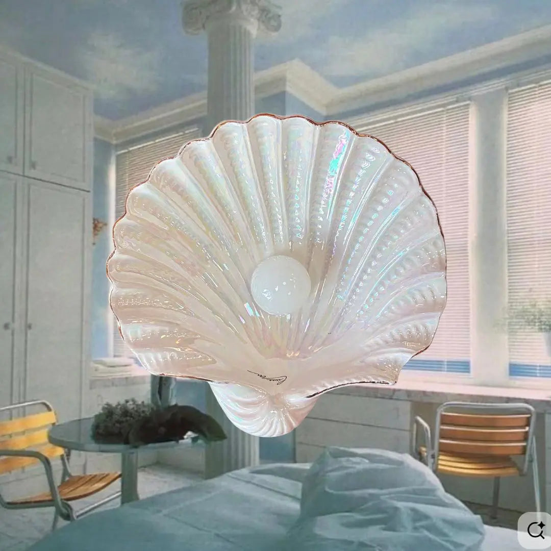 Coupe coquillage vintage en céramique nacrée aux reflets irisés
